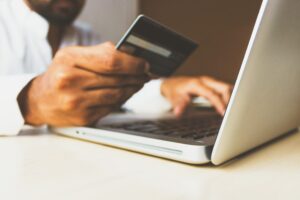 person holding credit card